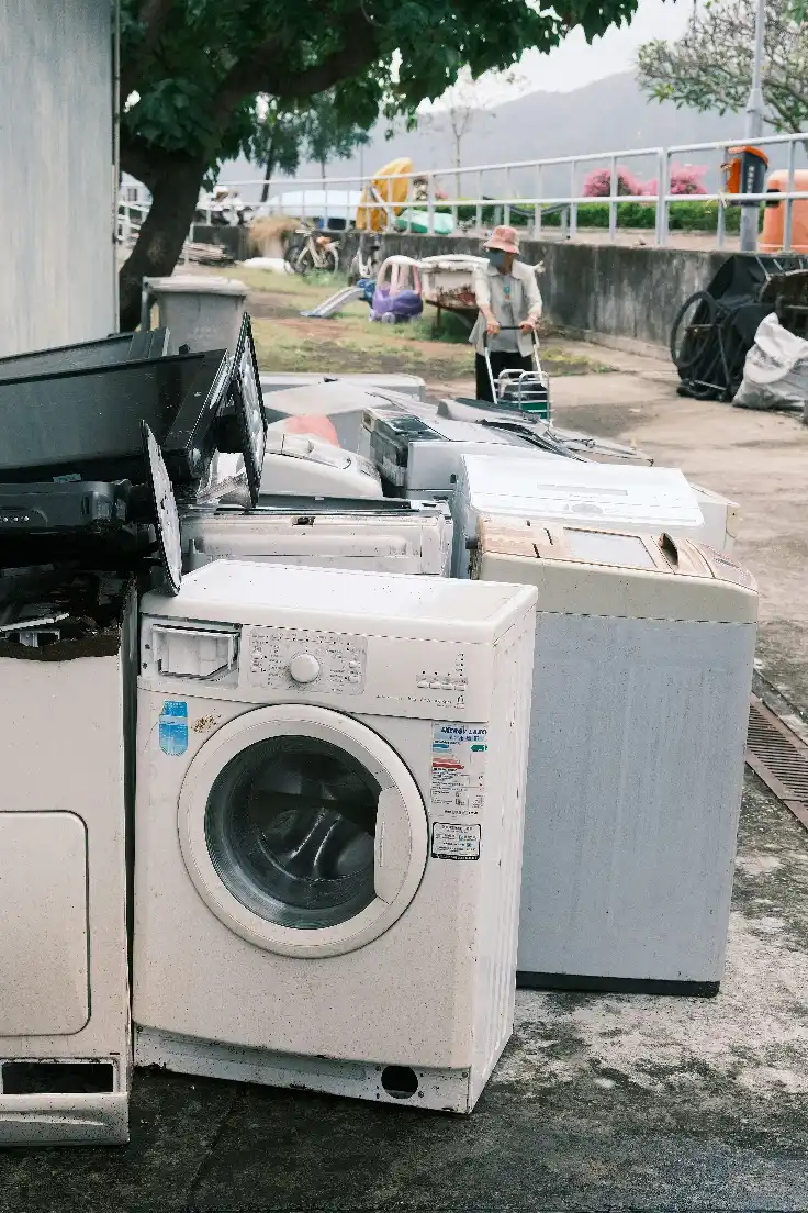 Recyclable washing machine metal parts, motors and appliance components prepared for scrap recycling in Melbourne