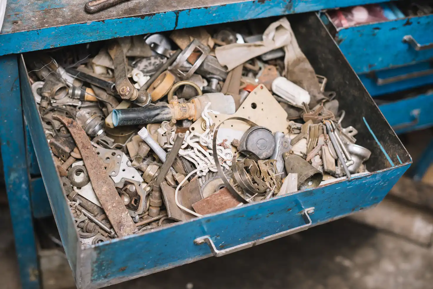 Metal workshop drawers and components ready for scrap pickup