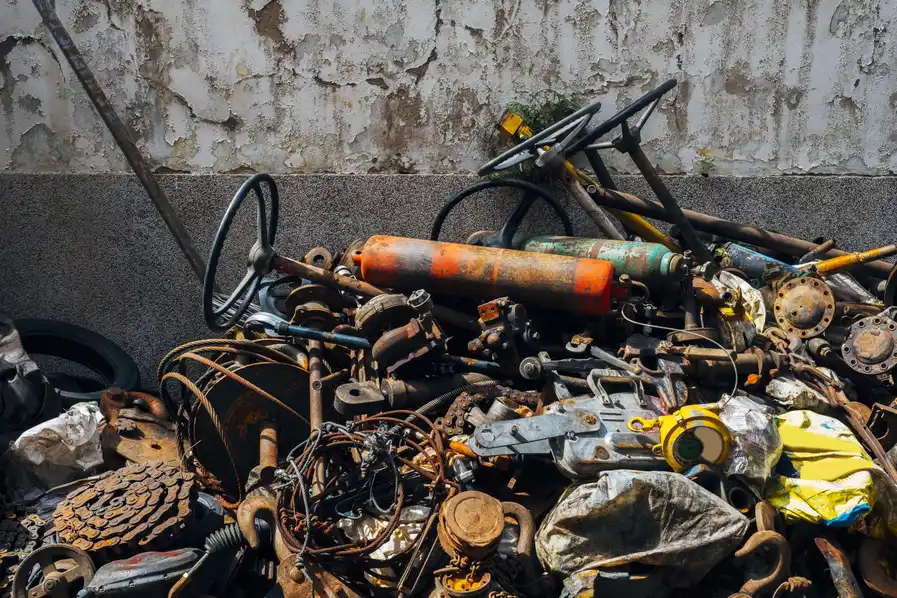 Old rusty steel junk and scrap metal collection
